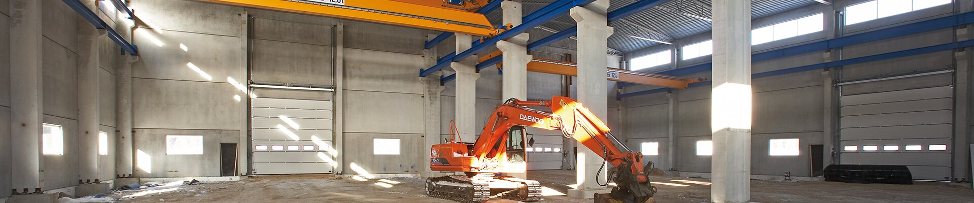 ABUS double girder overhead travelling crane ZLK with a load capacity of 20 t and a single girder overhead travelling crane ELK with a load capacity of 12.5 t at the company Örs Cementgjuteri in Sweden