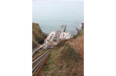 View of rescue station from above where boats launch, on the coast of England