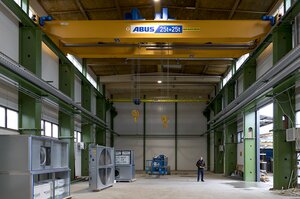 Double girder travelling crane with two wire rope hoists in new hall in Finland