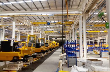 HB-Systems and single girder traveling cranes in production for truck mixers in India